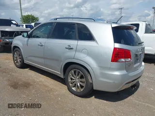 2011 Kia Sorento SX with VIN 5XYKWDA21BG144877, listed as a IAAI auction lot 42597458 with 238,443 mi miles and . Bid and sale history available at DreamBid. Image 3.