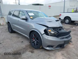 2018 Dodge Durango SRT with VIN 1C4SDJGJ5JC256006, listed as a IAAI auction lot 41038356 with 71,385 mi miles and . Bid and sale history available at carsss.com. Image 1.