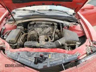2013 Chevrolet Camaro LT z VIN 2G1FB3D38D9210912, wystawiony jako Copart lot #50599075 z przebiegiem 150 467 mil mil oraz Szkoda całkowita • Salvage title. Historia ofert i sprzedaży dostępna na DreamBid. Obrazek 13.