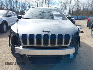 2016 Jeep Cherokee Sport with VIN 1C4PJMAS5GW348869, listed as a IAAI auction lot 41672622 with 166,330 mi miles. Bid and sale history available at carsss.com. Image 6.