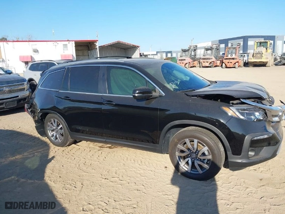 2021 Honda Pilot EX-L with VIN 5FNYF5H50MB038821, listed as a IAAI auction lot 41519771 with 29,401 mi miles. Bid and sale history available at carsss.com. Image 13.