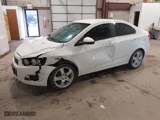 2015 Chevrolet Sonic LTZ with VIN 1G1JE5SB7F4121961, listed as a IAAI auction lot 41310464 with NaN miles. Bid and sale history available at carsss.com. Image 17.