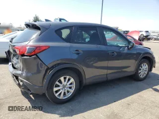 2016 Mazda CX-5 Touring with VIN JM3KE2CY2G0612029, listed as a Copart auction lot 53810155 with 159,915 mi miles and Salvage Title. Bid and sale history available at DreamBid. Image 3.