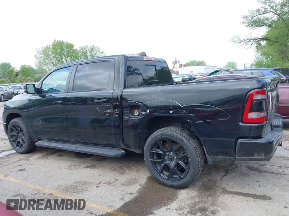 2023 Ram 1500 Laramie with VIN 1C6SRFJTXPN541328, listed as a IAAI auction lot 42121615 with 61,939 mi miles and . Bid and sale history available at DreamBid. Image 14.