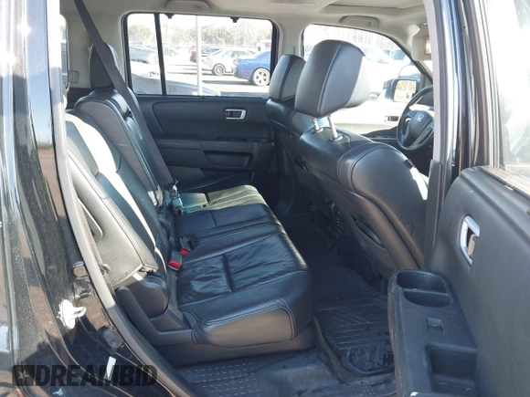 2013 Honda Pilot Touring with VIN 5FNYF4H9XDB047796, listed as a IAAI auction lot 41591189 with 188,579 mi miles and . Bid and sale history available at carsss.com. Image 8.