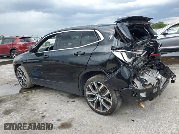 2020 BMW X2 sDrive28i with VIN WBXYH9C05L5R39182, listed as a Copart auction lot 56929605 with 87,253 mi miles and Non repairable. Bid and sale history available at DreamBid. Image 2.