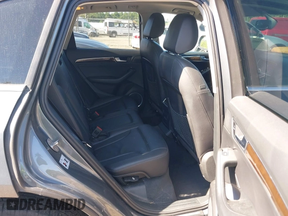 2016 Audi Q5 Premium Plus z VIN WA1L2AFP5GA140352, wystawiony jako IAAI lot #42605558 z przebiegiem 106 185 mil mil oraz . Historia ofert i sprzedaży dostępna na DreamBid. Obrazek 8.