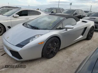 2007 Lamborghini Gallardo z VIN ZHWGU22T57LA05137, wystawiony jako Copart lot #76275354 z przebiegiem Nie podano mil oraz Szkody całkowita. Historia ofert i sprzedaży dostępna na DreamBid. Obrazek 1.