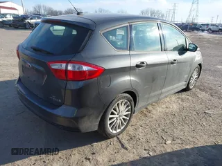 2016 Ford C-Max SE with VIN 1FADP5AU6GL116636, listed as a IAAI auction lot 41369977 with Not Provided miles and . Bid and sale history available at DreamBid. Image 4.