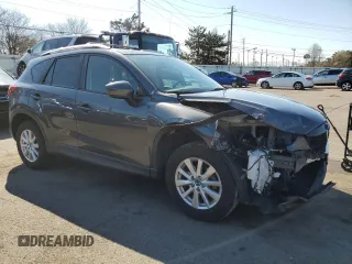 2014 Mazda CX-5 Touring with VIN JM3KE2CY7E0366690, listed as a Copart auction lot 50783635 with 127,853 mi miles and Salvage Title. Bid and sale history available at carsss.com. Image 4.