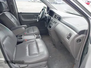 2004 Honda Odyssey EX-L z VIN 5FNRL189X4B013837, wystawiony jako IAAI lot #42215471 z przebiegiem 208 729 mil mil oraz . Historia ofert i sprzedaży dostępna na DreamBid. Obrazek 5.