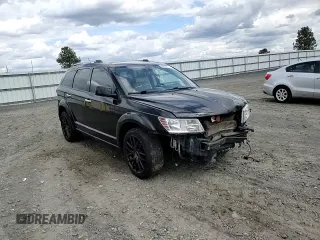 2014 Dodge Journey R/T z VIN 3C4PDDFG6ET262355, wystawiony jako Copart lot #56803935 z przebiegiem 99 562 mil mil oraz Szkoda całkowita • Salvage title. Historia ofert i sprzedaży dostępna na DreamBid. Obrazek 14.