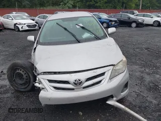 2011 Toyota Corolla L with VIN 2T1BU4EE1BC724135, listed as a IAAI auction lot 40054479 with 190,235 mi miles. Bid and sale history available at carsss.com. Image 11.