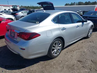 2017 Infiniti Q70 3.7 with VIN JN1BY1AP3HM740250, listed as a IAAI auction lot 41858552 with 173,907 mi miles and . Bid and sale history available at DreamBid. Image 4.