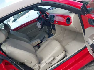 2015 Volkswagen Beetle 1.8T w/Tech with VIN 3VW517AT4FM803238, listed as a IAAI auction lot 41812373 with 42,369 mi miles and . Bid and sale history available at DreamBid. Image 5.