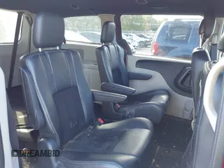 2014 Dodge Grand Caravan SXT with VIN 2C4RDGCG8ER311850, listed as a IAAI auction lot 40598088 with 138,010 mi miles and . Bid and sale history available at DreamBid. Image 8.