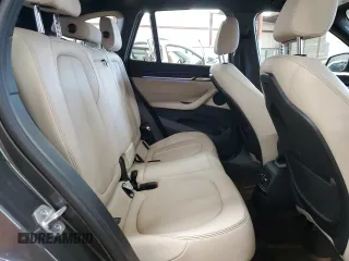 2021 BMW X1 xDrive28i with VIN WBXJG9C00M5S35249, listed as a Copart auction lot 61895775 with 34,641 mi miles and Salvage title. Bid and sale history available at DreamBid. Image 11.