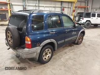 2003 Chevrolet Tracker ZR2 z VIN 2CNBJ734736905310, wystawiony jako IAAI lot #41519431 z przebiegiem 177 643 mil mil oraz . Historia ofert i sprzedaży dostępna na DreamBid. Obrazek 4.