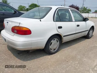 2001 Chevrolet Prizm z VIN 1Y1SK52881Z428636, wystawiony jako IAAI lot #42372783 z przebiegiem 169 729 mil mil oraz . Historia ofert i sprzedaży dostępna na DreamBid. Obrazek 4.