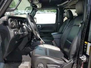 2020 Jeep Wrangler Unlimited Sahara High Altitude with VIN 1C4HJXEG1LW324669, listed as a Copart auction lot 56554095 with 42,098 mi miles and Salvage title. Bid and sale history available at DreamBid. Image 7.