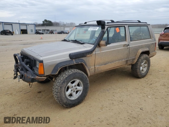 1993 Jeep Cherokee Sport with VIN 1J4FJ67S6PL580133, listed as a Copart auction lot 43230005 with 122,173 mi miles and Salvage Title. Bid and sale history available at carsss.com. Image 1.