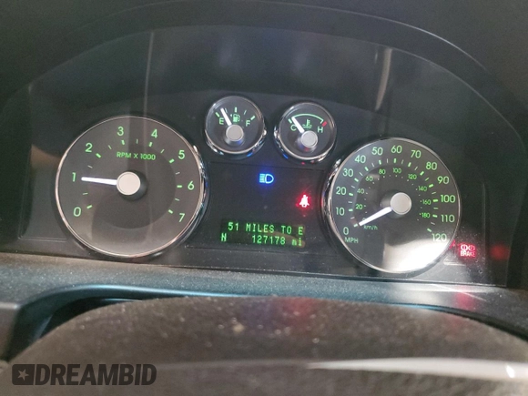 2006 Mercury Milan Premier with VIN 3MEHM08116R638785, listed as a Copart auction lot 64641395 with 127,178 mi miles and Salvage title. Bid and sale history available at DreamBid. Image 9.