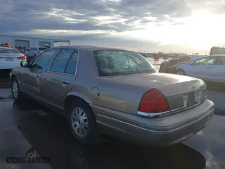 2005 Ford Crown Victoria LX with VIN 2FAFP74W55X130190, listed as a IAAI auction lot 41138306 with 122,738 mi miles. Bid and sale history available at carsss.com. Image 3.