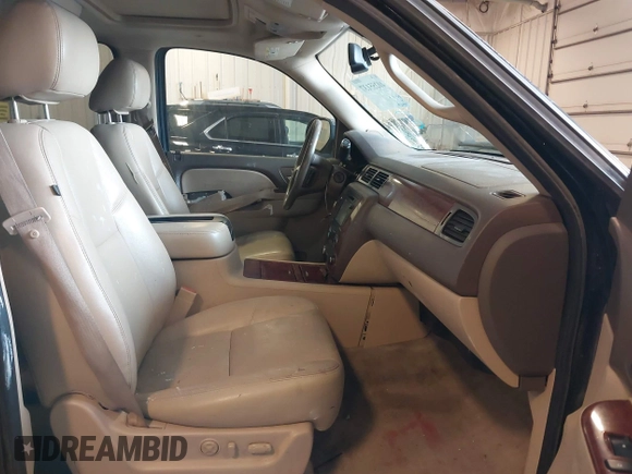 2012 Chevrolet Tahoe LTZ with VIN 1GNSKCE02CR297261, listed as a IAAI auction lot 40255137 with 283,110 mi miles and . Bid and sale history available at DreamBid. Image 5.