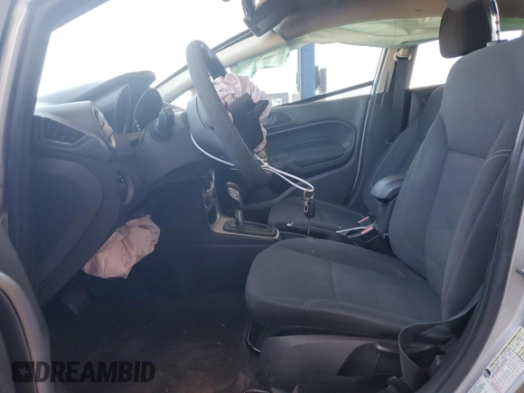 2017 Ford Fiesta SE z VIN 3FADP4BJ5HM145950, wystawiony jako Copart lot #54406095 z przebiegiem 45 395 mil mil oraz Szkoda całkowita • Salvage title. Historia ofert i sprzedaży dostępna na DreamBid. Obrazek 7.