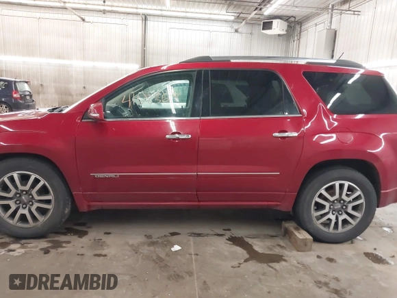 2014 GMC Acadia Denali with VIN 1GKKVTKD0EJ120088, listed as a IAAI auction lot 41683678 with 202,214 mi miles and . Bid and sale history available at carsss.com. Image 15.