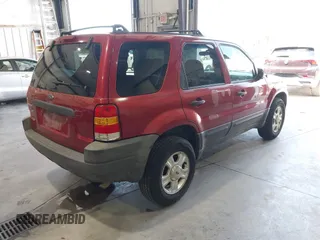 2004 Ford Escape XLT with VIN 1FMYU031X4KA86449, listed as a IAAI auction lot 42629506 with 231,115 mi miles and . Bid and sale history available at DreamBid. Image 4.