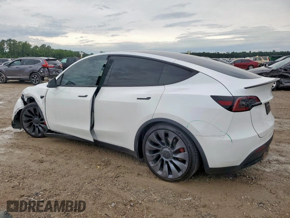 2024 Tesla Model Y Performance z VIN 7SAYGDEF0RA266605, wystawiony jako Copart lot #57820905 z przebiegiem Nie podano mil oraz Szkoda całkowita • Salvage title. Historia ofert i sprzedaży dostępna na DreamBid. Obrazek 2.