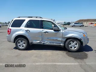2011 Ford Escape Hybrid with VIN 1FMCU4K33BKB53300, listed as a IAAI auction lot 42561682 with 144,628 mi miles and . Bid and sale history available at DreamBid. Image 13.