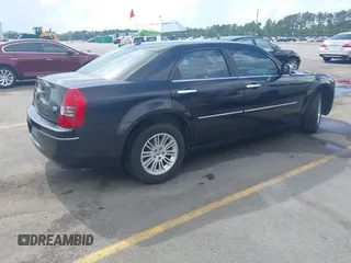 2010 Chrysler 300 Touring with VIN 2C3CA5CV3AH195530, listed as a IAAI auction lot 42103512 with 291,724 mi miles and . Bid and sale history available at DreamBid. Image 4.