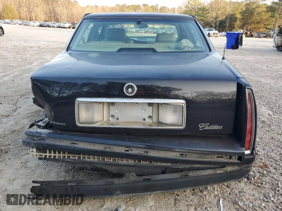 1999 Cadillac DeVille z VIN 1G6KD54Y5XU767438, wystawiony jako Copart lot #86133764 z przebiegiem Nie podano mil oraz Nie do naprawy • Non repairable. Historia ofert i sprzedaży dostępna na DreamBid. Obrazek 6.