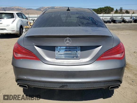 2014 Mercedes-Benz CLA 250 with VIN WDDSJ4EB5EN159989, listed as a Copart auction lot 64262795 with 67,515 mi miles and Salvage title. Bid and sale history available at DreamBid. Image 6.