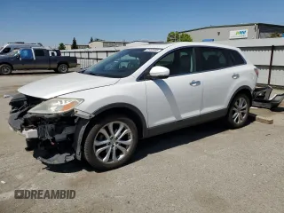2012 Mazda CX-9 Grand Touring z VIN JM3TB3DVXC0356062, wystawiony jako Copart lot #61493905 z przebiegiem 64 731 mil mil oraz Szkoda całkowita • Salvage title. Historia ofert i sprzedaży dostępna na DreamBid. Obrazek 1.