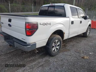 2013 Ford F-150 XL with VIN 1FTFW1EF8DKF20839, listed as a IAAI auction lot 41906614 with 243,411 mi miles and . Bid and sale history available at carsss.com. Image 4.