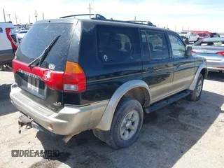 1998 Mitsubishi Montero LS z VIN JA4MT31P9WP005522, wystawiony jako IAAI lot #42047242 z przebiegiem Nie podano mil oraz . Historia ofert i sprzedaży dostępna na DreamBid. Obrazek 4.
