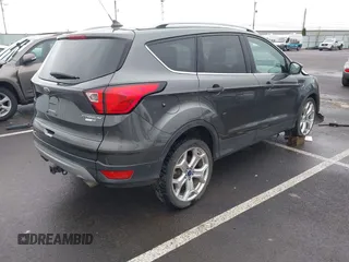 2019 Ford Escape Titanium with VIN 1FMCU9J99KUA64158, listed as a IAAI auction lot 41980102 with 52,514 mi miles. Bid and sale history available at carsss.com. Image 4.