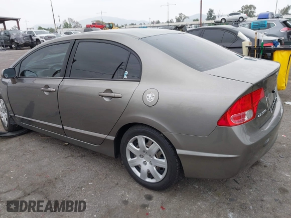 2006 Honda Civic LX with VIN 2HGFA16586H507296, listed as a IAAI auction lot 42101001 with 144,781 mi miles and . Bid and sale history available at DreamBid. Image 3.