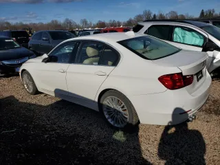 2012 BMW 3 Series 328i with VIN WBA3A5C55CF257491, listed as a Copart auction lot 51131705 with 187,130 mi miles and Salvage Title. Bid and sale history available at carsss.com. Image 2.