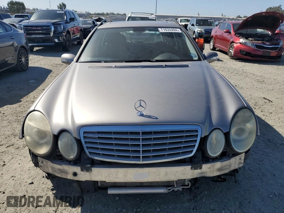 2006 Mercedes-Benz E 500 with VIN WDBUH83J96X194071, listed as a Copart auction lot 71035284 with 121,818 mi miles and Salvage Title. Bid and sale history available at carsss.com. Image 5.