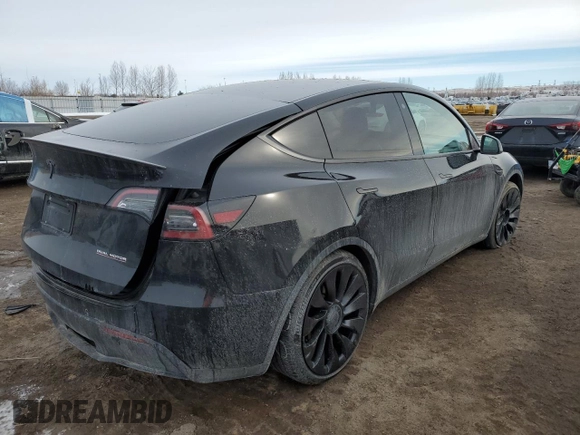 2022 Tesla Model Y Performance z VIN 7SAYGDEF5NF512464, wystawiony jako Copart lot #46337165 z przebiegiem 74 761 mil mil oraz Szkoda całkowita • Salvage title. Historia ofert i sprzedaży dostępna na DreamBid. Obrazek 3.