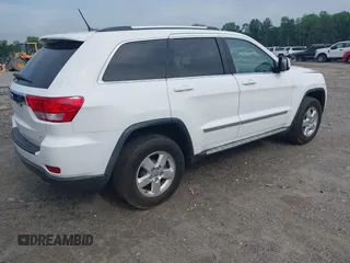 2013 Jeep Grand Cherokee Laredo с VIN 1C4RJEAG6DC647164, выставлен на аукционе IAAI как лот 42282295 с пробегом 128 511 миль миль и . История ставок и продаж доступна на DreamBid. Изображение 4.