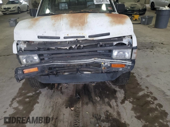 1988 Nissan Hardbody E z VIN 1N6ND16Y3JC351348, wystawiony jako Copart lot #80864914 z przebiegiem 184 397 mil mil oraz Szkody całkowita. Historia ofert i sprzedaży dostępna na DreamBid. Obrazek 12.