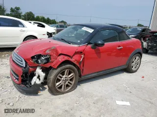 2013 MINI Cooper Coupe with VIN WMWSX1C57DT507660, listed as a Copart auction lot 63930314 with 119,945 mi miles and Non Repairable. Bid and sale history available at carsss.com. Image 1.