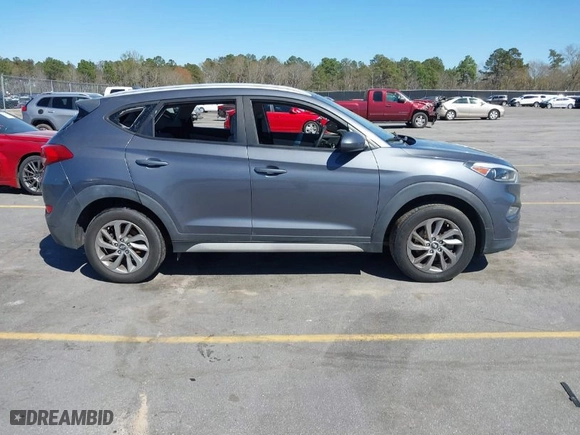 2018 Hyundai Tucson SEL with VIN KM8J3CA48JU718402, listed as a IAAI auction lot 41810363 with 218,853 mi miles. Bid and sale history available at carsss.com. Image 13.