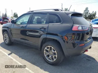 2021 Jeep Cherokee Trailhawk with VIN 1C4PJMBX8MD167153, listed as a Copart auction lot 54929845 with 52,800 mi miles and Clean title. Bid and sale history available at DreamBid. Image 2.