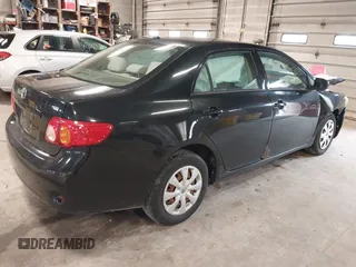 2009 Toyota Corolla with VIN 1NXBU40E29Z133733, listed as a IAAI auction lot 42093904 with 229,509 mi miles. Bid and sale history available at carsss.com. Image 4.